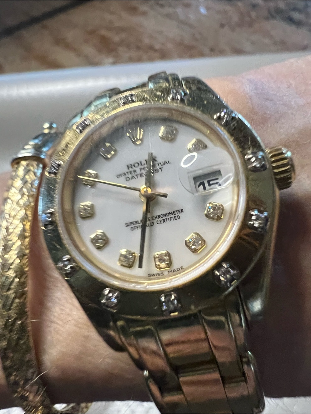 ROLEX Women's Gold pearl master with  Diamond Dial and scattered  diamond bezel